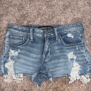 Express denim shorts with lace accent